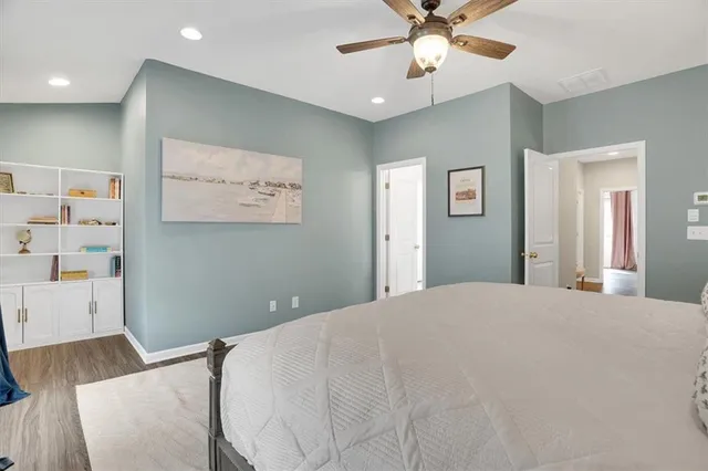 a bathroom with a shower and a sink