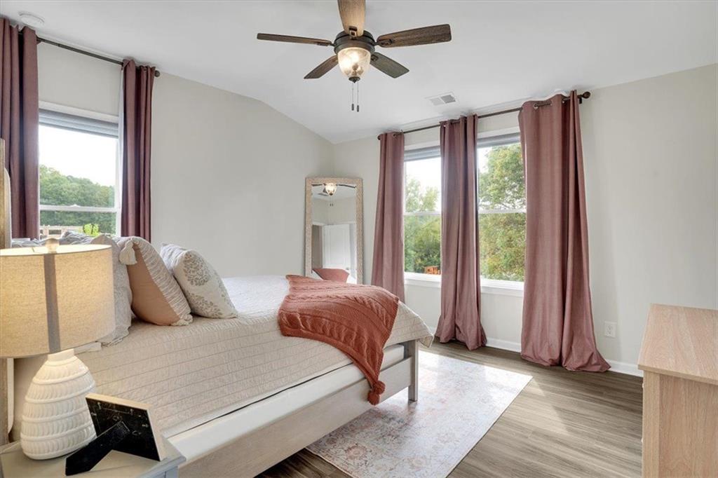 775 Hamilton Circle Southeast Atlanta, GA 30312 - Photo 23 of 24 a bedroom with furniture and a large window