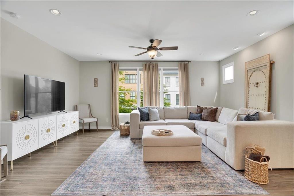 775 Hamilton Circle Southeast Atlanta, GA 30312 - Photo 4 of 24 a living room with furniture and a flat screen tv