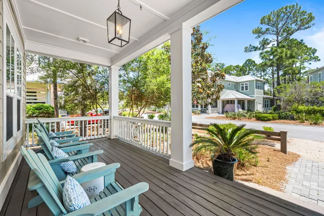 a view of a two chairs in the balcony