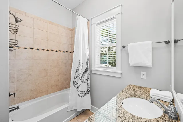 a view of balcony with wooden floor