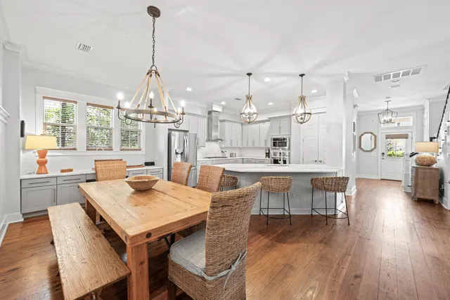 a view of dining table and chandelier