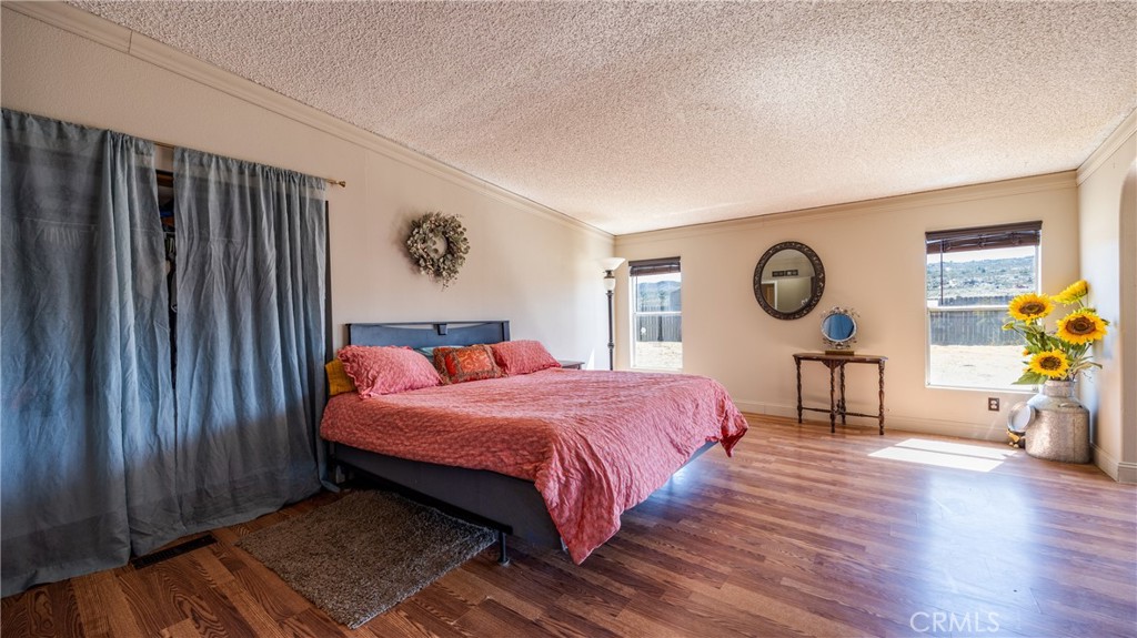 39550 Kirby Road Anza, CA 92539 - Photo 21 of 53 a bedroom with a bed and window