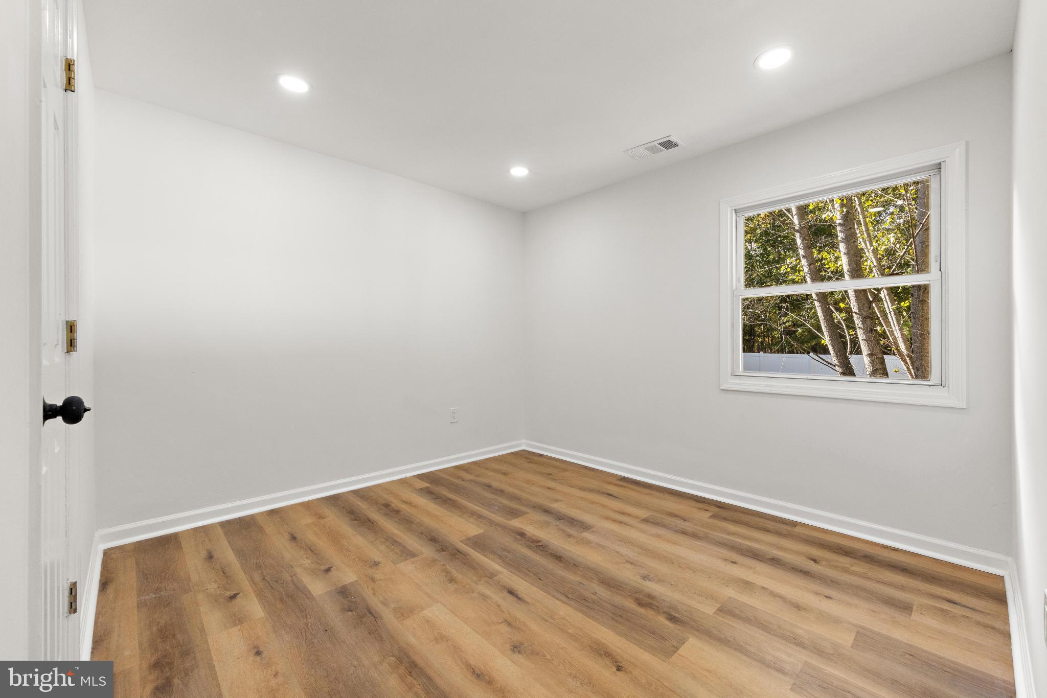 716 6th Road Newtonville, NJ 08346 - Photo 17 of 40 an empty room with a window