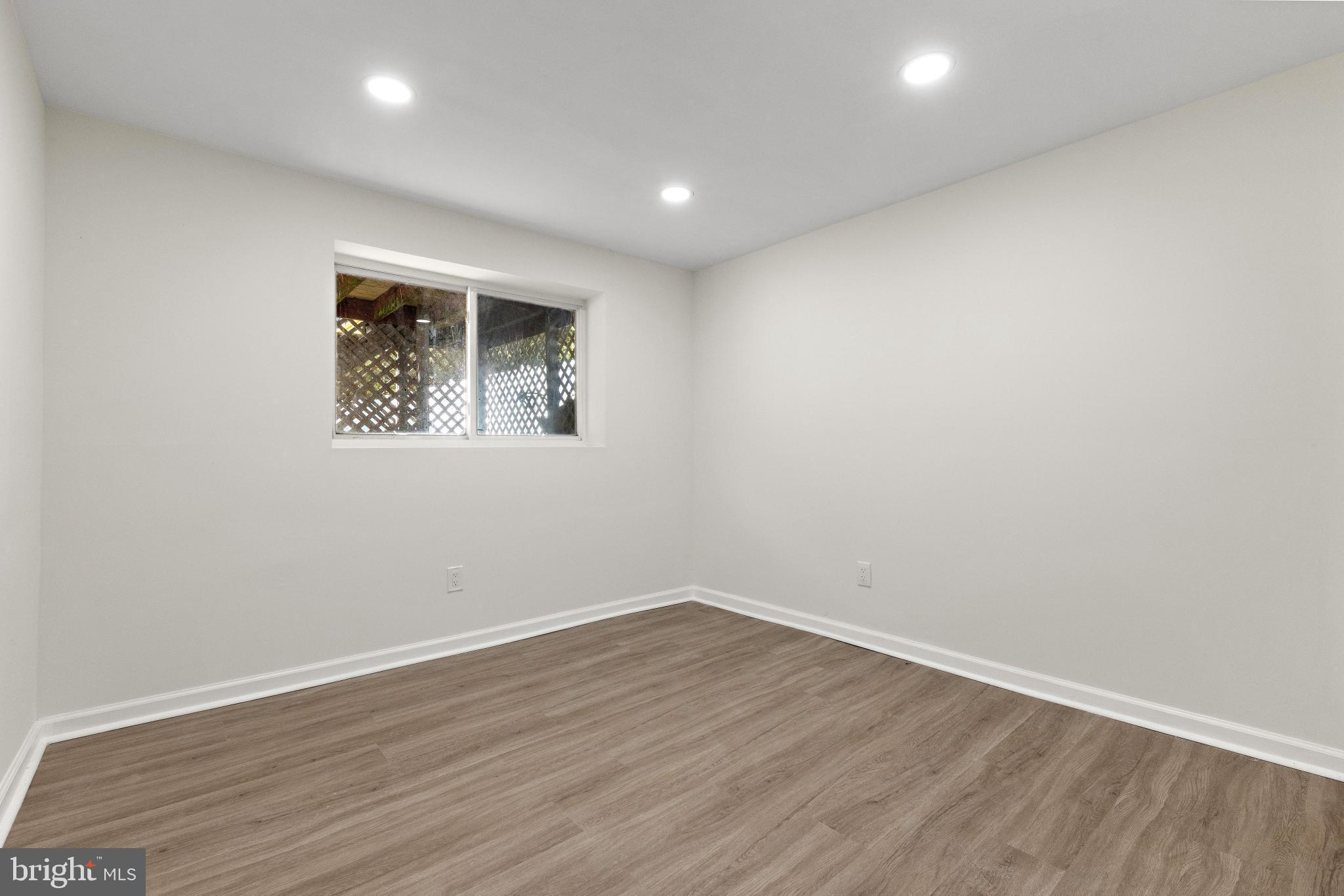 716 6th Road Newtonville, NJ 08346 - Photo 21 of 40 a view of room with wooden floor and window