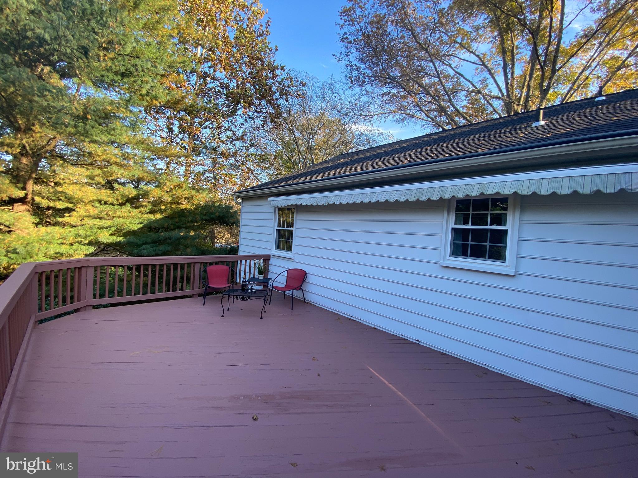 9424 Dunloggin Road Ellicott City, MD 21042 - Photo 15 of 48 Deck with full-coverage power awning