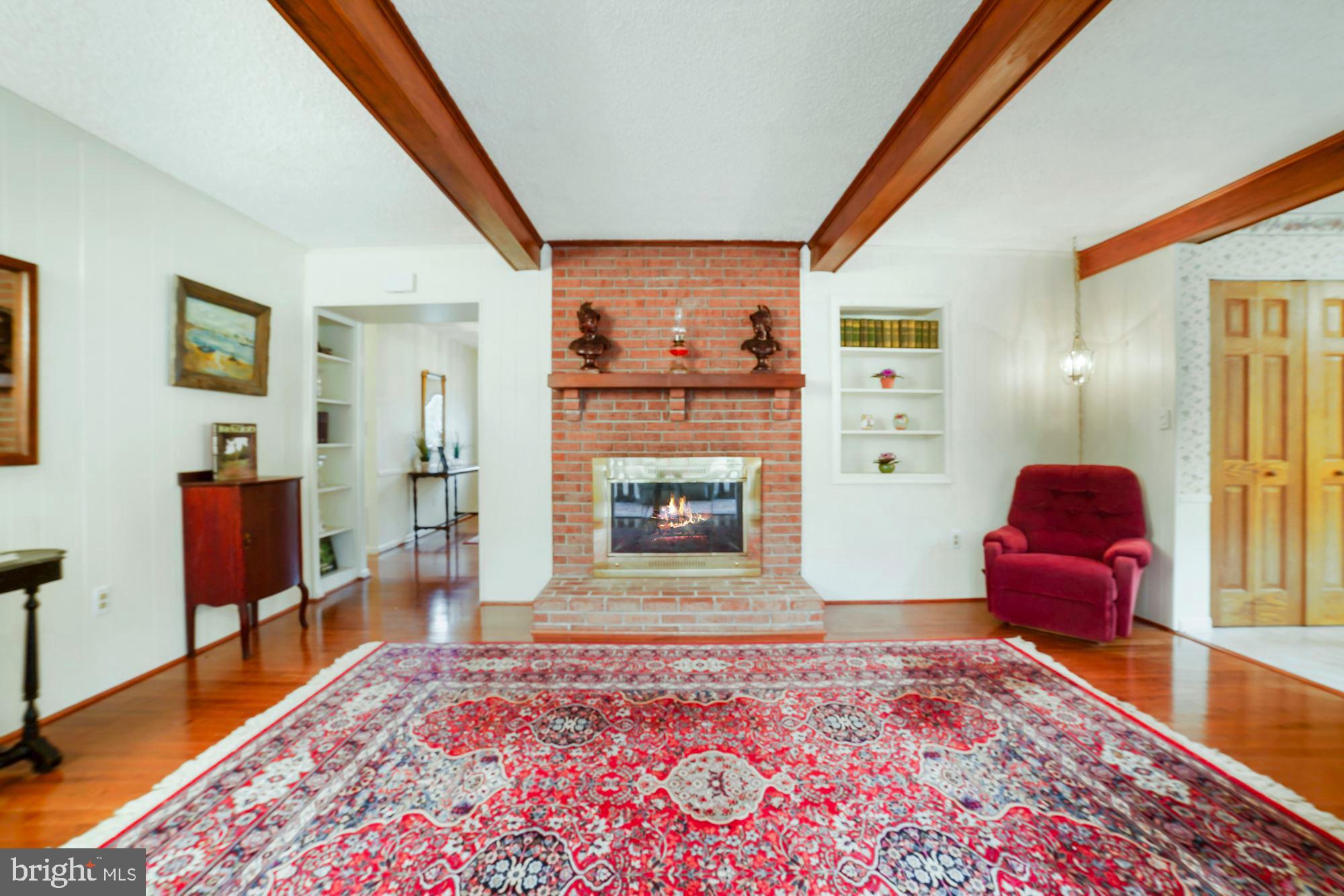 9424 Dunloggin Road Ellicott City, MD 21042 - Photo 30 of 48 Family room with gas fireplace