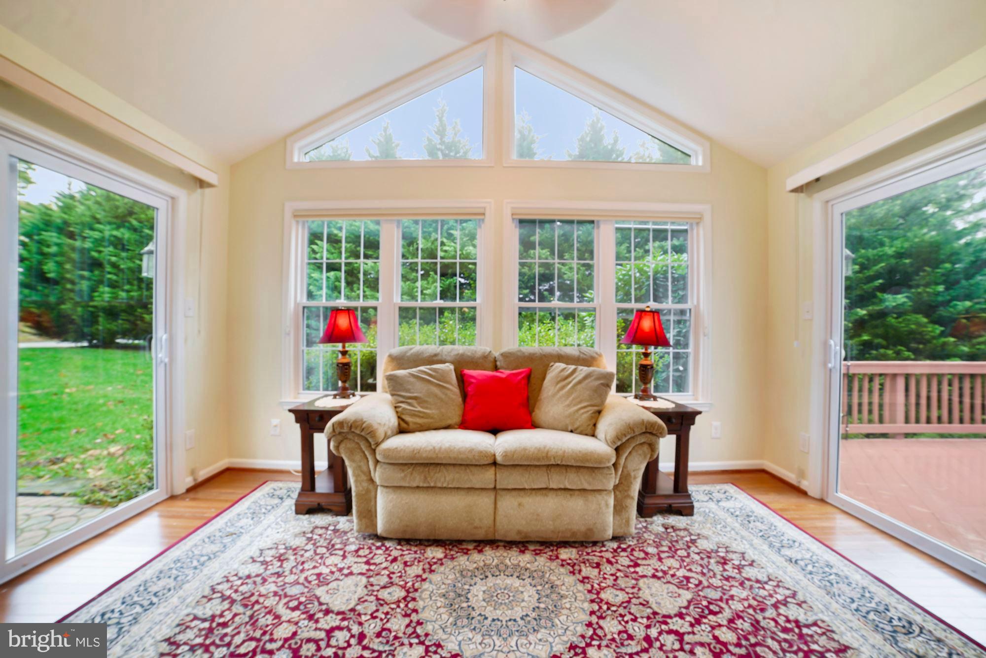 9424 Dunloggin Road Ellicott City, MD 21042 - Photo 33 of 48 Fantastic sunroom with sliders to deck AND patio!