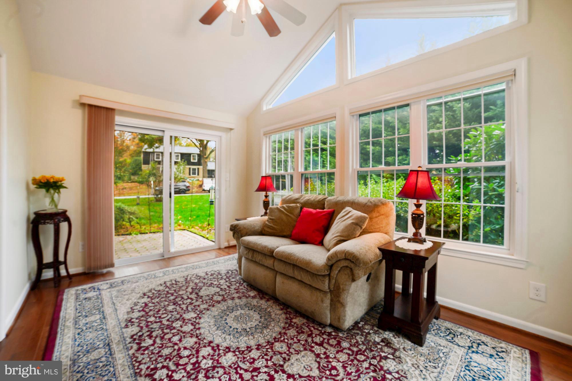 9424 Dunloggin Road Ellicott City, MD 21042 - Photo 34 of 48 Sunroom with mini-split system, vaulted ceiling