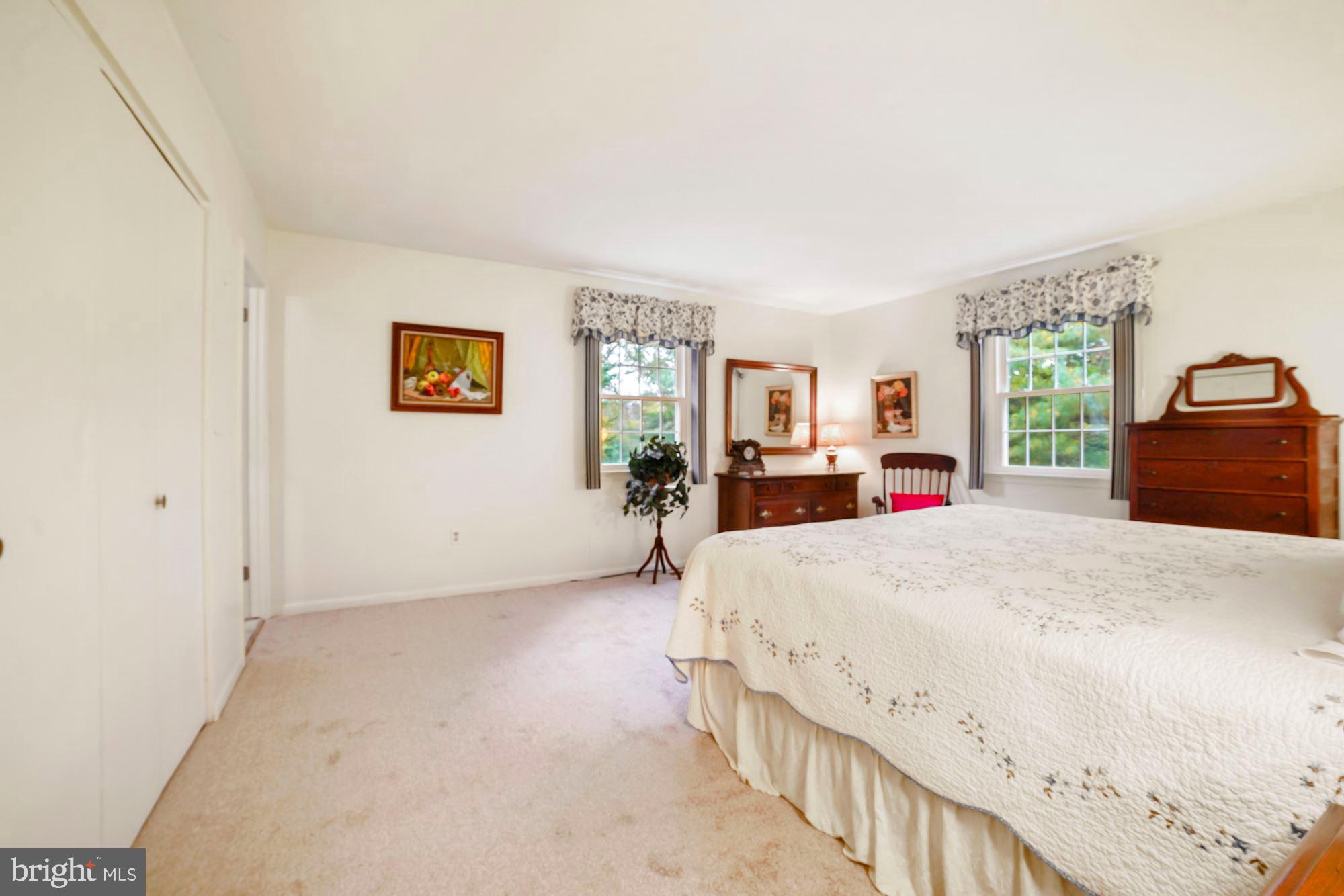 9424 Dunloggin Road Ellicott City, MD 21042 - Photo 36 of 48 Primary bedroom with en suite