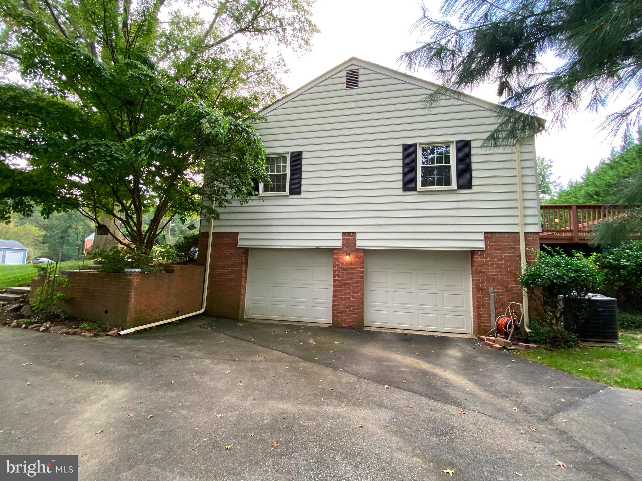 9424 Dunloggin Road Ellicott City, MD 21042 - Photo 8 of 48 2 car oversized garage with workshop