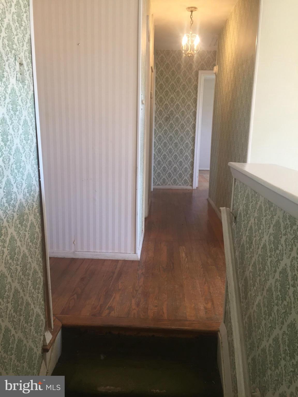 11708 Smoketree Road Potomac, MD 20854 - Photo 7 of 20 hallway to bedrooms