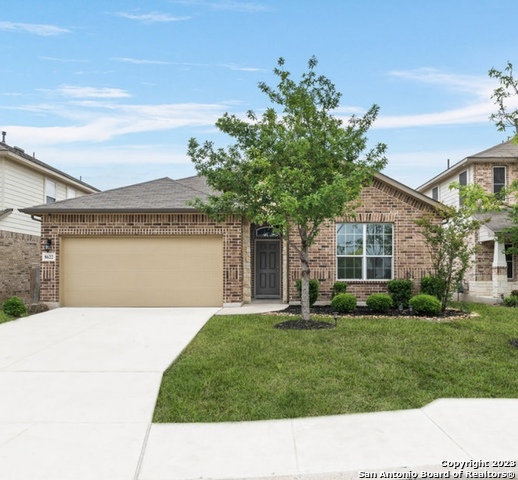 a house view with a garden space