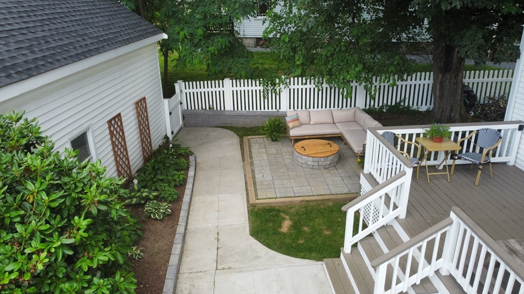 76 Milk Street, Unit 1 Westborough, MA 01581 - Photo 19 of 19 a view of a chair and table in the balcony