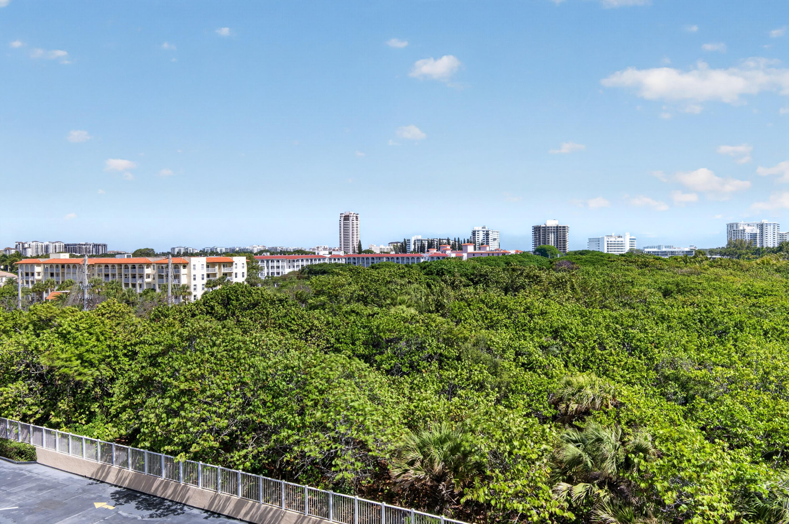 1180 South Ocean Boulevard, Unit 5C Boca Raton, FL 33432 - Photo 12 of 43 a view of a bunch of trees