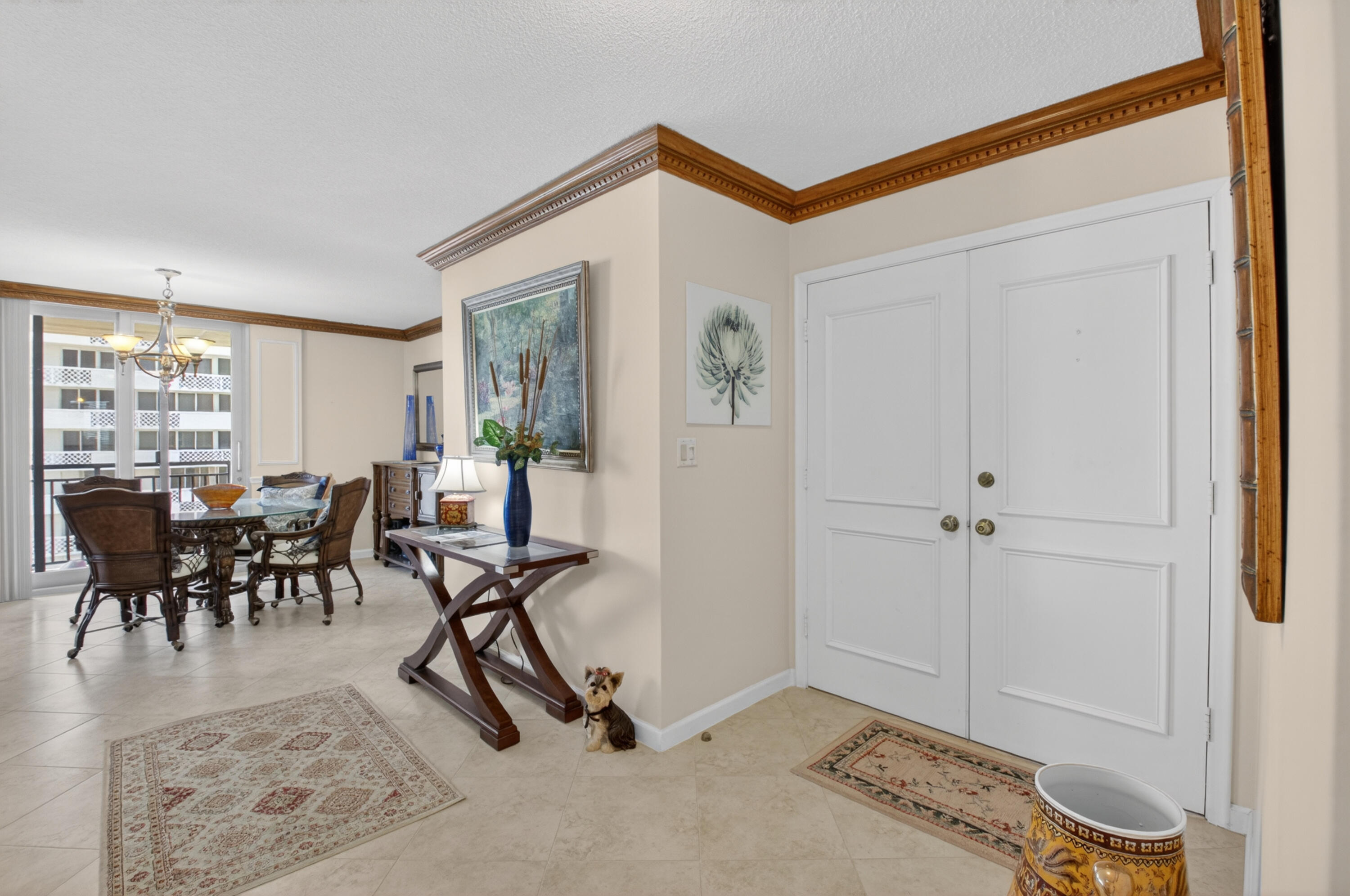 1180 South Ocean Boulevard, Unit 5C Boca Raton, FL 33432 - Photo 15 of 43 a view of a livingroom with furniture and window