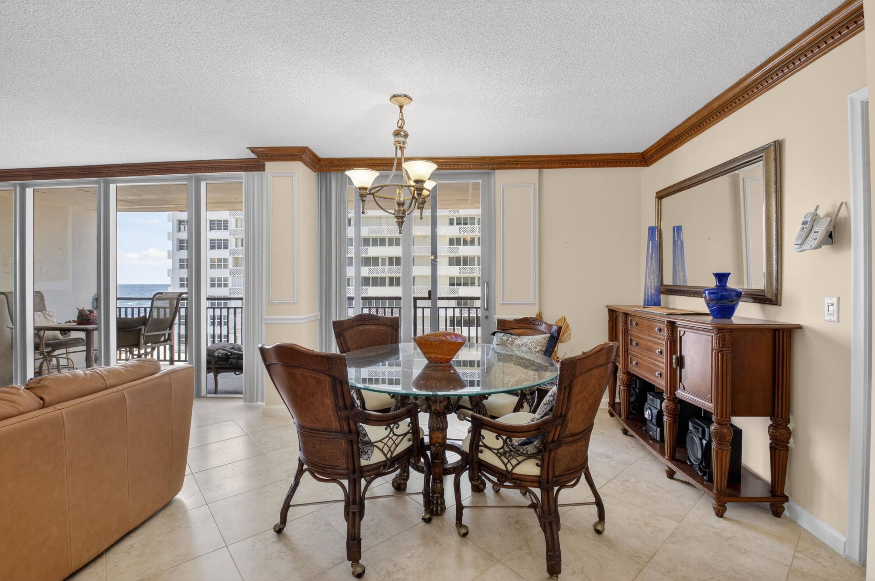 1180 South Ocean Boulevard, Unit 5C Boca Raton, FL 33432 - Photo 21 of 43 a view of a dining room with furniture window and outside view
