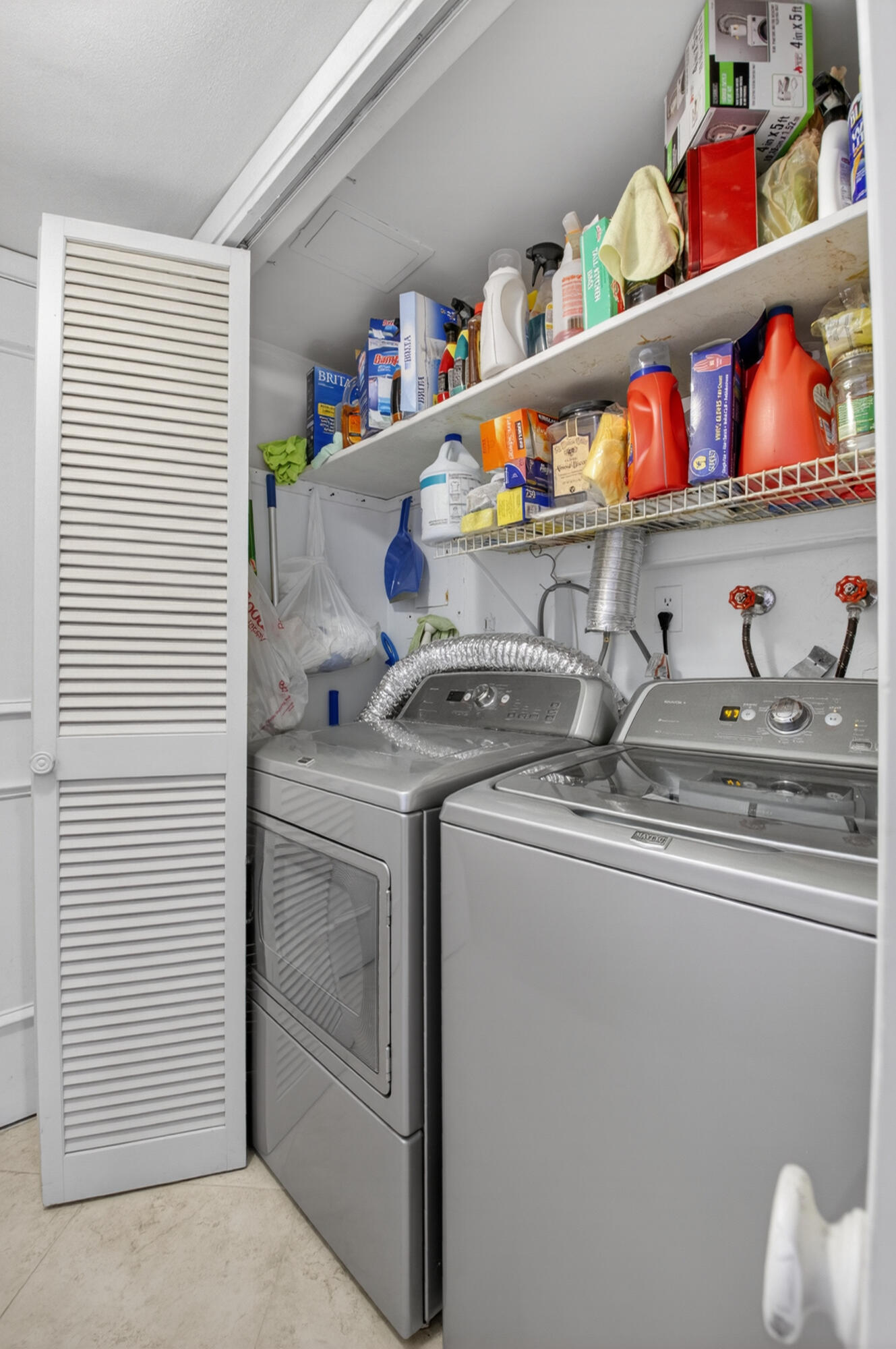 1180 South Ocean Boulevard, Unit 5C Boca Raton, FL 33432 - Photo 39 of 43 a room with storage and utility