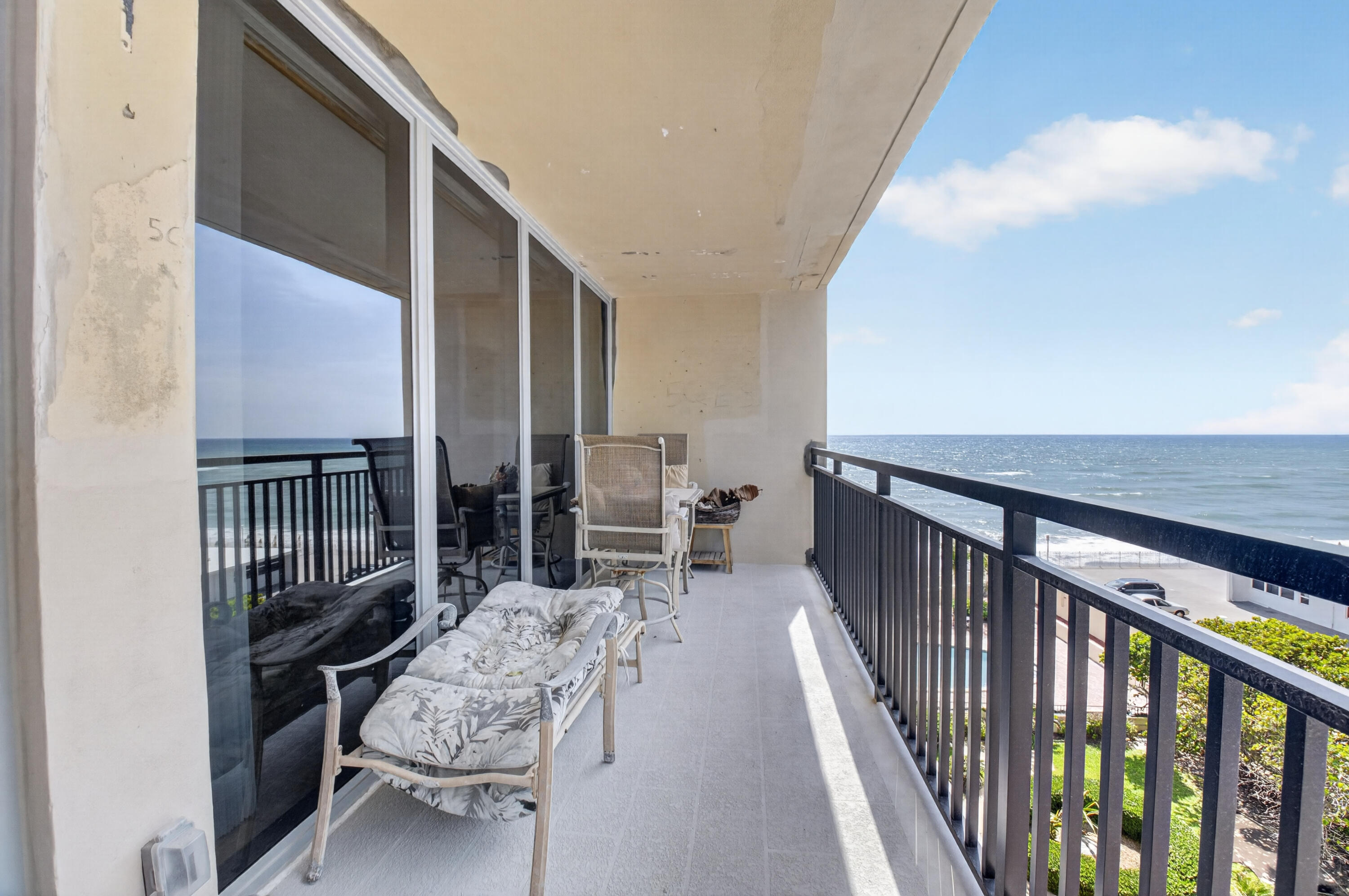 1180 South Ocean Boulevard, Unit 5C Boca Raton, FL 33432 - Photo 41 of 43 a balcony view with chairs