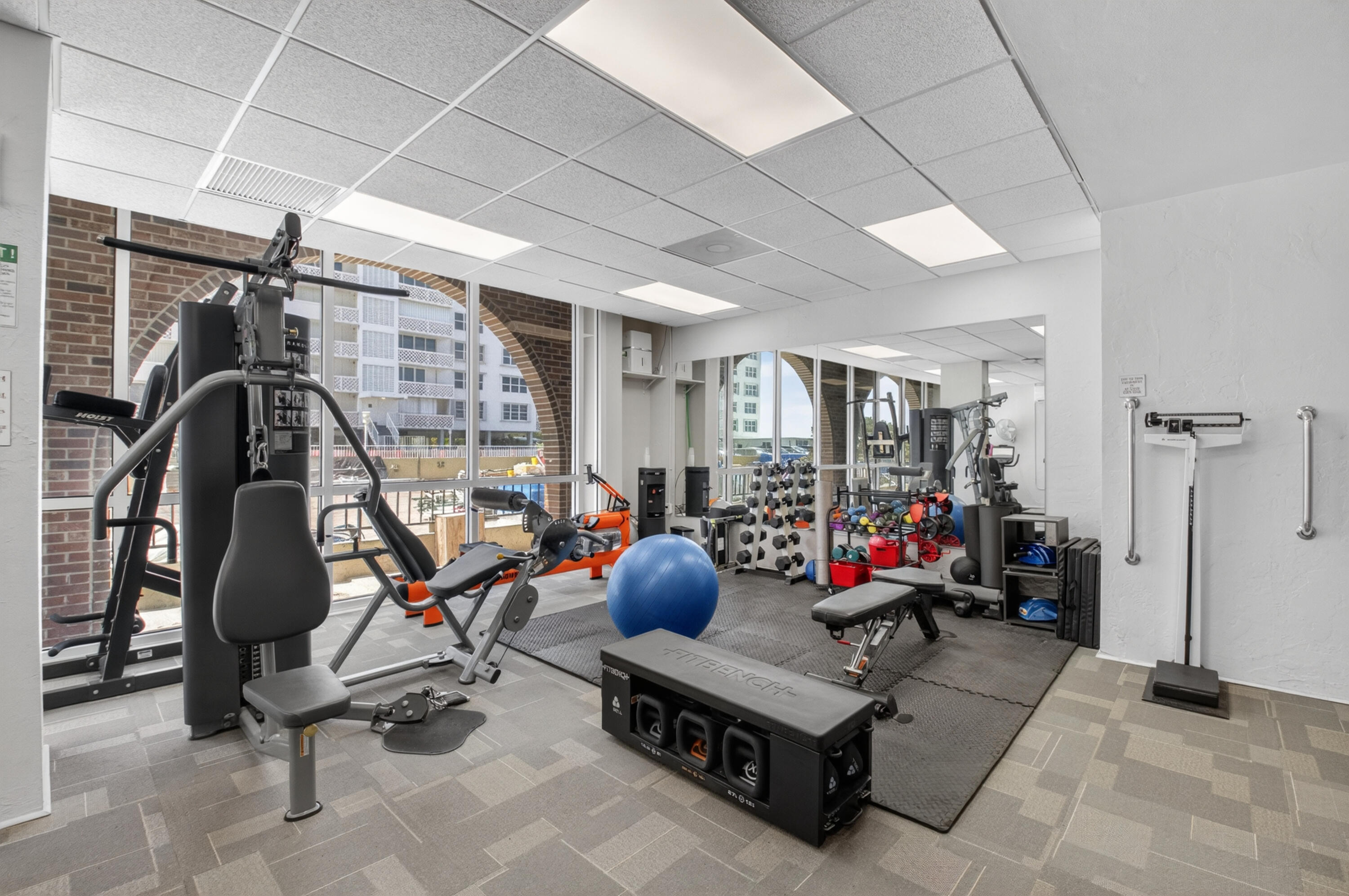 1180 South Ocean Boulevard, Unit 5C Boca Raton, FL 33432 - Photo 9 of 43 a view of a room with gym equipment