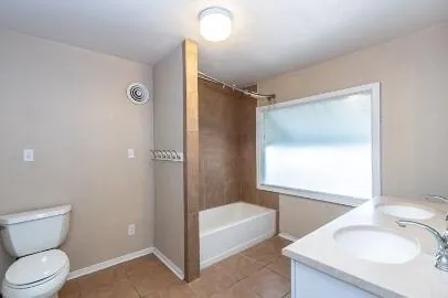 a bathroom with a sink a vanity and a mirror