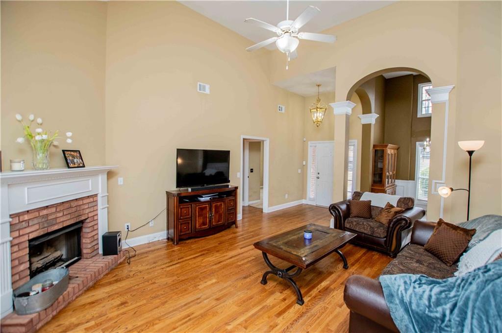 2657 Neighborhood Walk Villa Rica, GA 30180 - Photo 11 of 81 a living room with furniture fireplace and flat screen tv