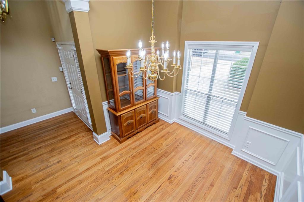 2657 Neighborhood Walk Villa Rica, GA 30180 - Photo 14 of 81 a view of a room with wooden floor and windows