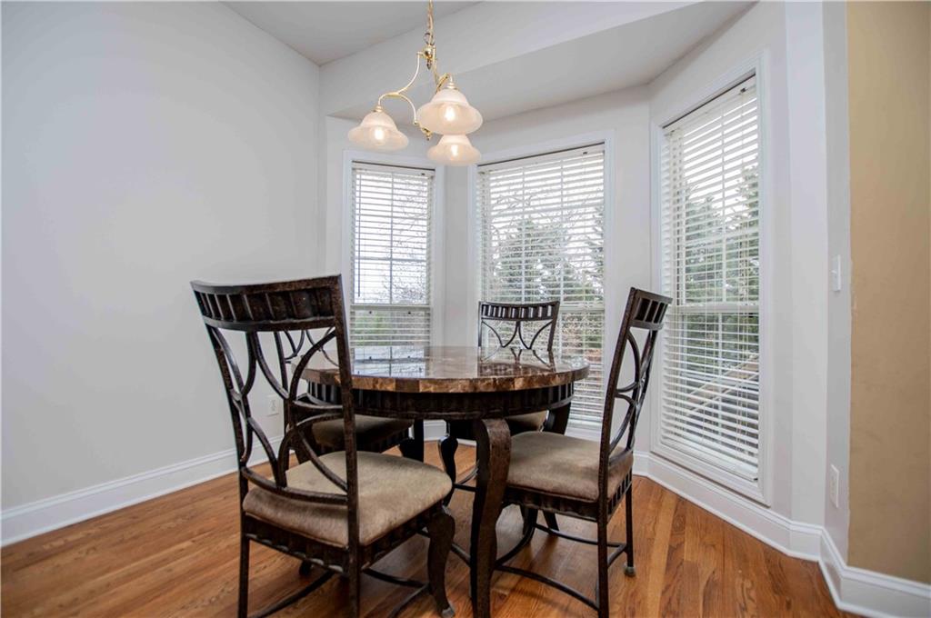 2657 Neighborhood Walk Villa Rica, GA 30180 - Photo 29 of 81 a view of a dining room with furniture and window