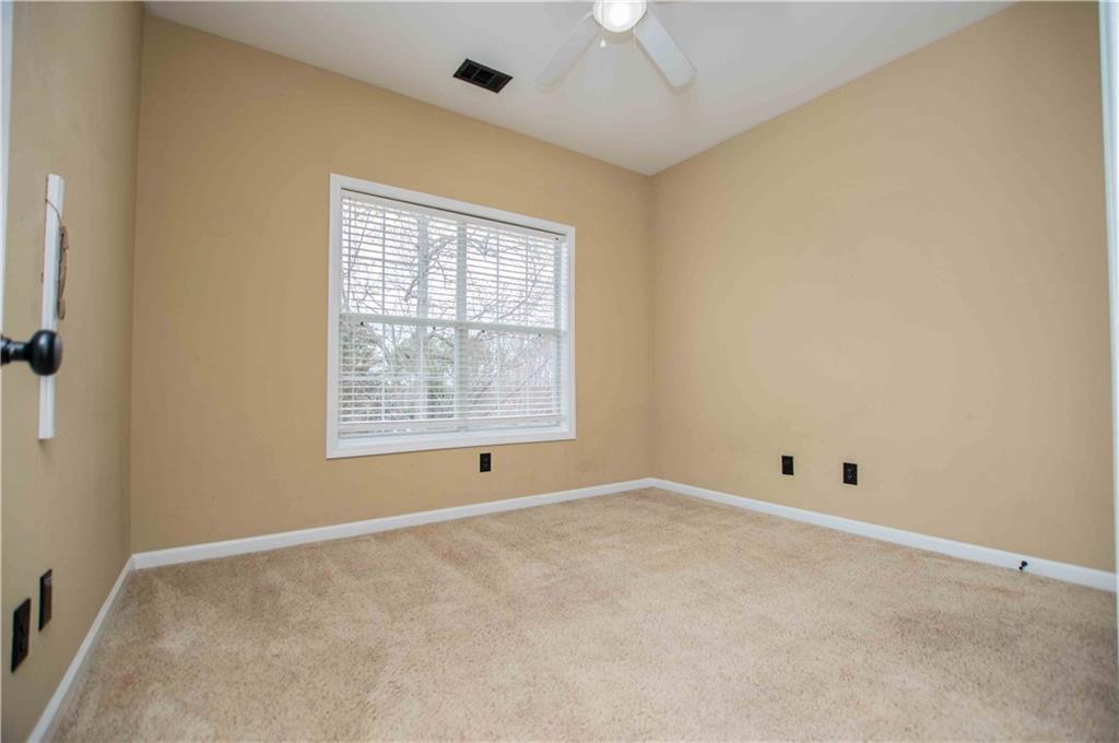 2657 Neighborhood Walk Villa Rica, GA 30180 - Photo 44 of 81 an empty room with a empty space and a window