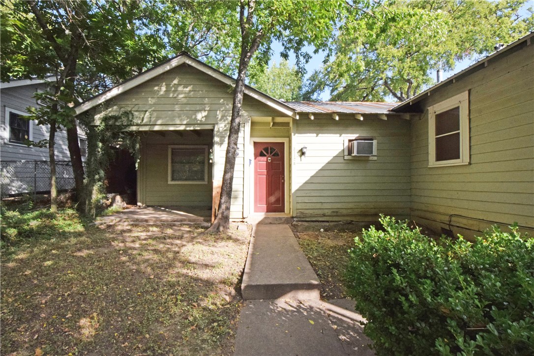 3112 Walling Drive, Unit B Austin, TX 78705 - Photo 1 of 1 a front view of a house with garden