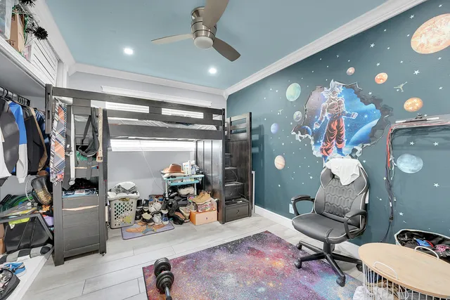 a room with gym equipment and a large window