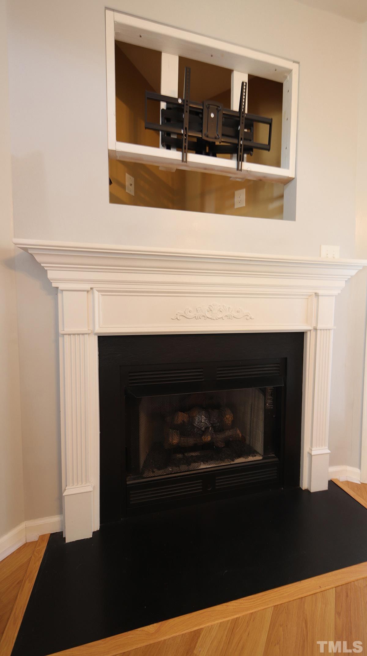 7626 Winners Edge Street Raleigh, NC 27617 - Photo 10 of 20 a kitchen with a stove and a microwave
