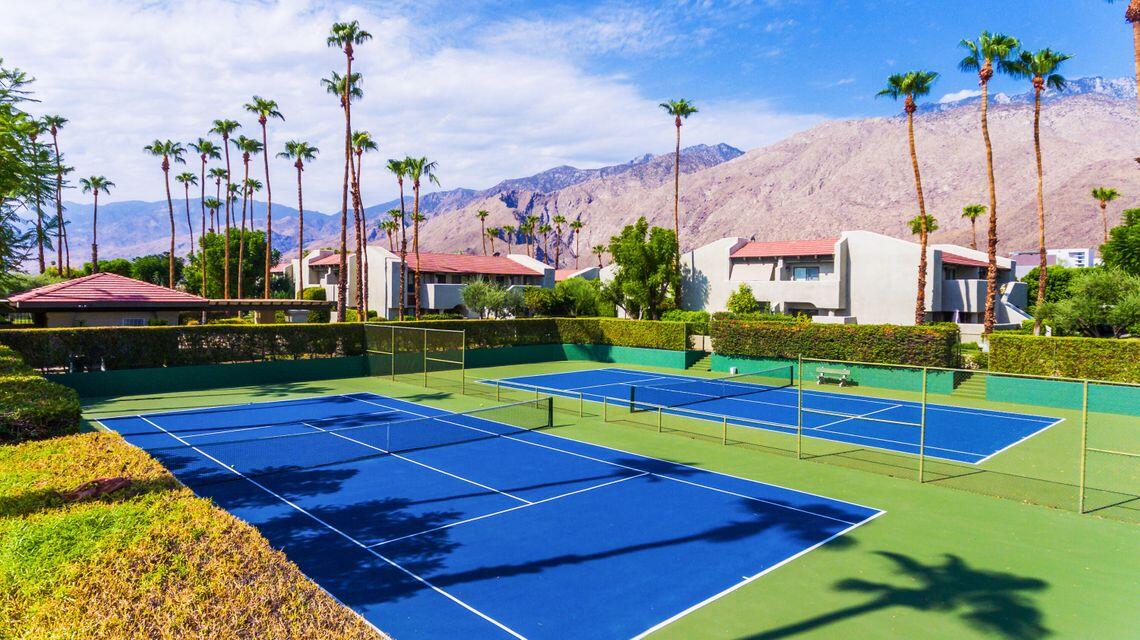 1100 East Amado Road, Unit 12B1 Palm Springs, CA 92262 - Photo 29 of 29 a view of an outdoor space pool patio and yard