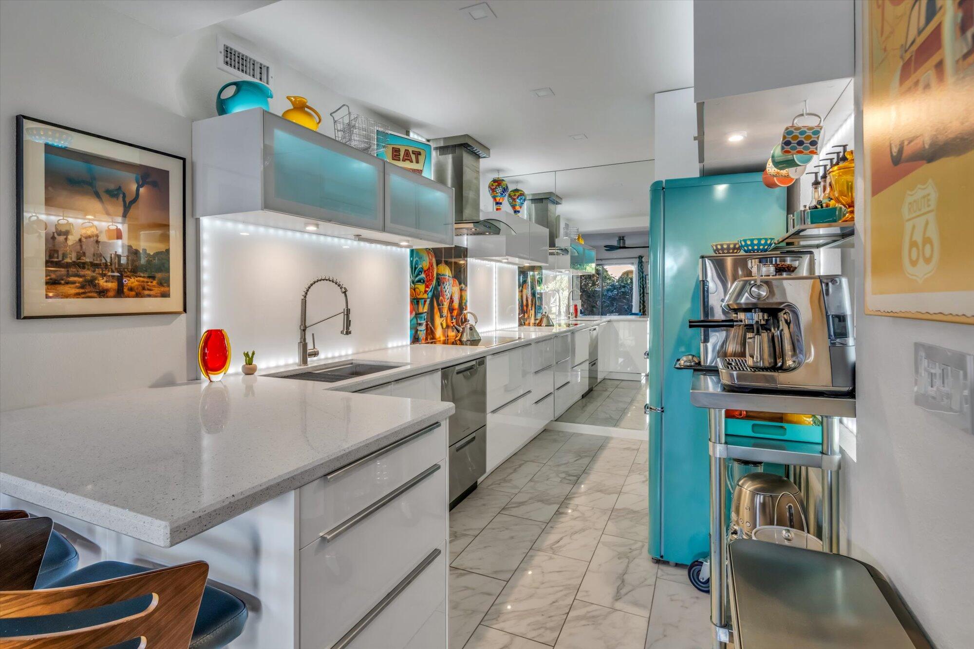 1100 East Amado Road, Unit 12B1 Palm Springs, CA 92262 - Photo 6 of 29 a kitchen with lots of counter top space