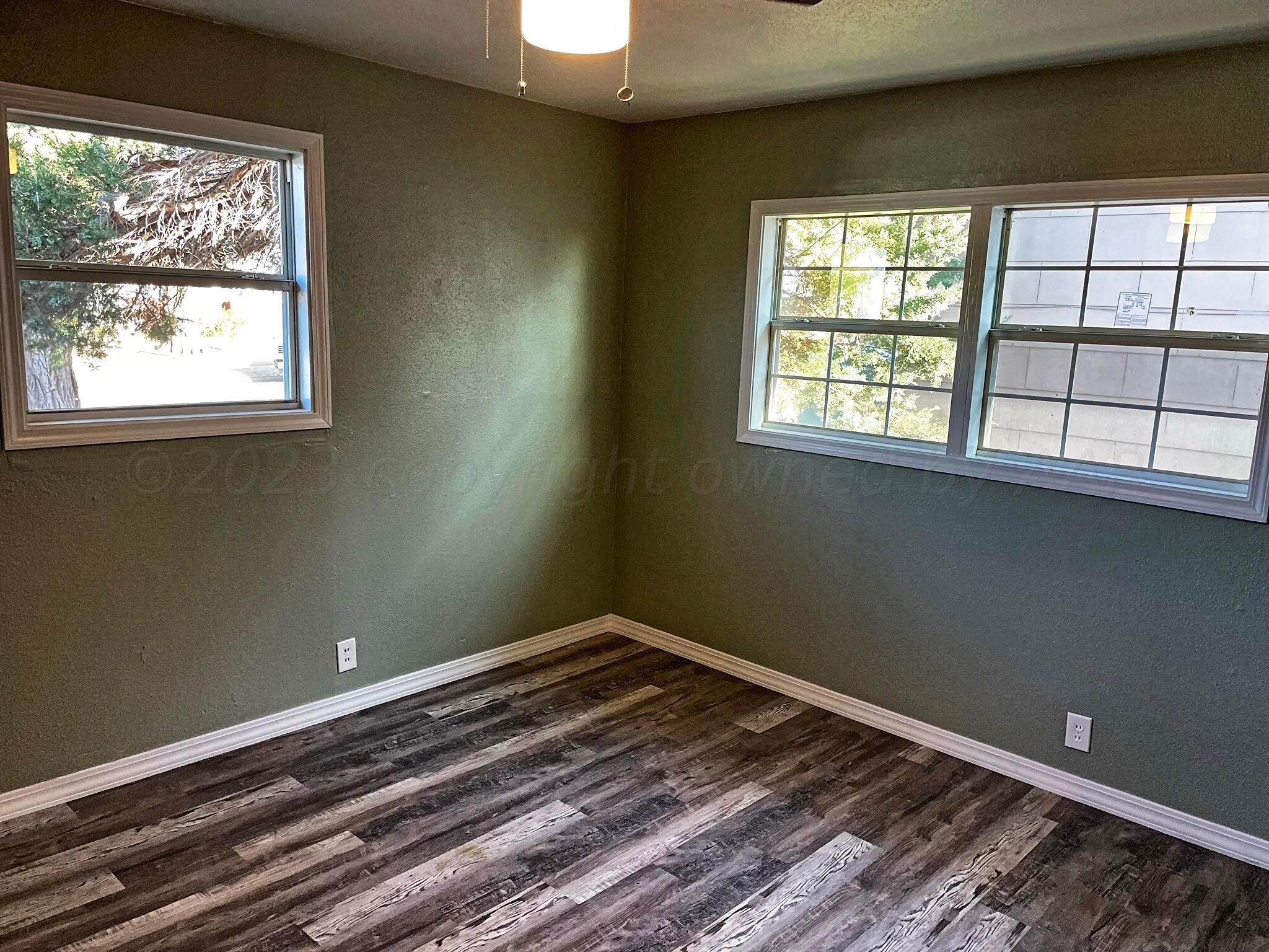 101 North Kentucky Street Perryton, TX 79070 - Photo 9 of 16 a view of a room with a window