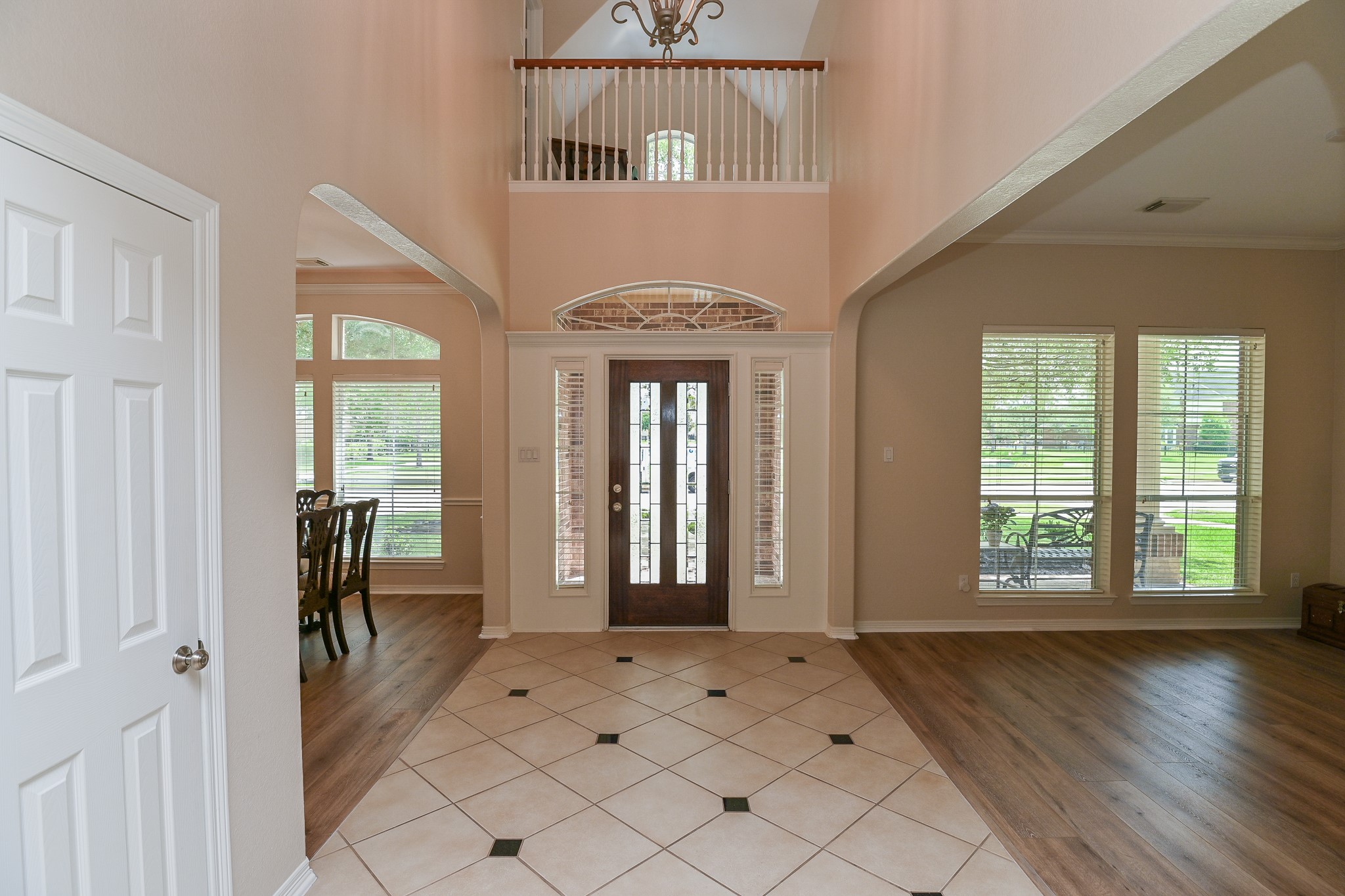 7218 Spring Run Lane Katy, TX 77494 - Photo 5 of 49 a view of a hallway with wooden floor and a front door