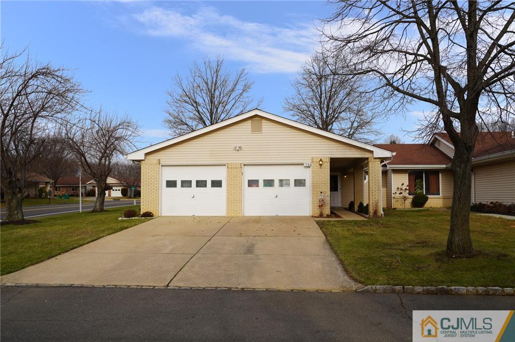 798 A Sparta Road Monroe Township, NJ 08831 - Photo 1 of 23 a view of a white house with a big yard and large trees