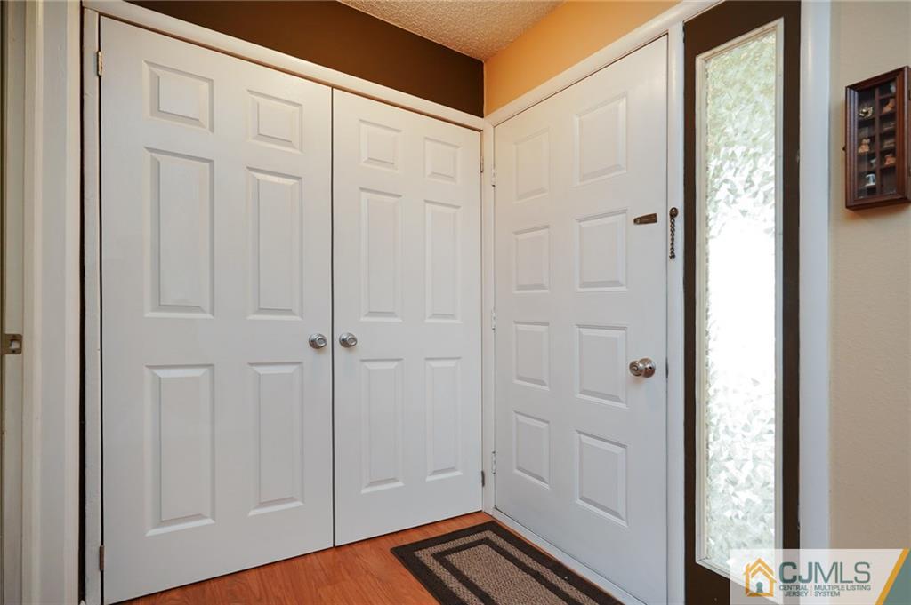 798 A Sparta Road Monroe Township, NJ 08831 - Photo 3 of 23 a view of a hallway with wooden floor