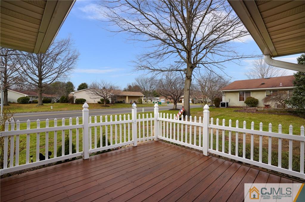 798 A Sparta Road Monroe Township, NJ 08831 - Photo 23 of 23 a view of a wooden deck with a yard