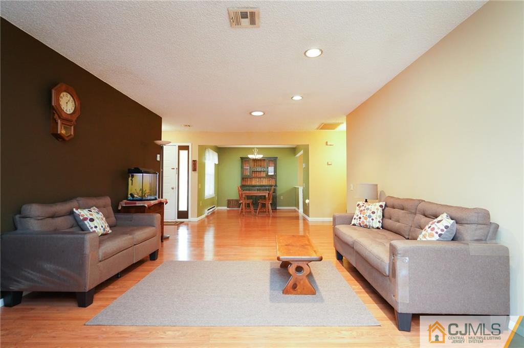 798 A Sparta Road Monroe Township, NJ 08831 - Photo 6 of 23 a living room with furniture and wooden floor