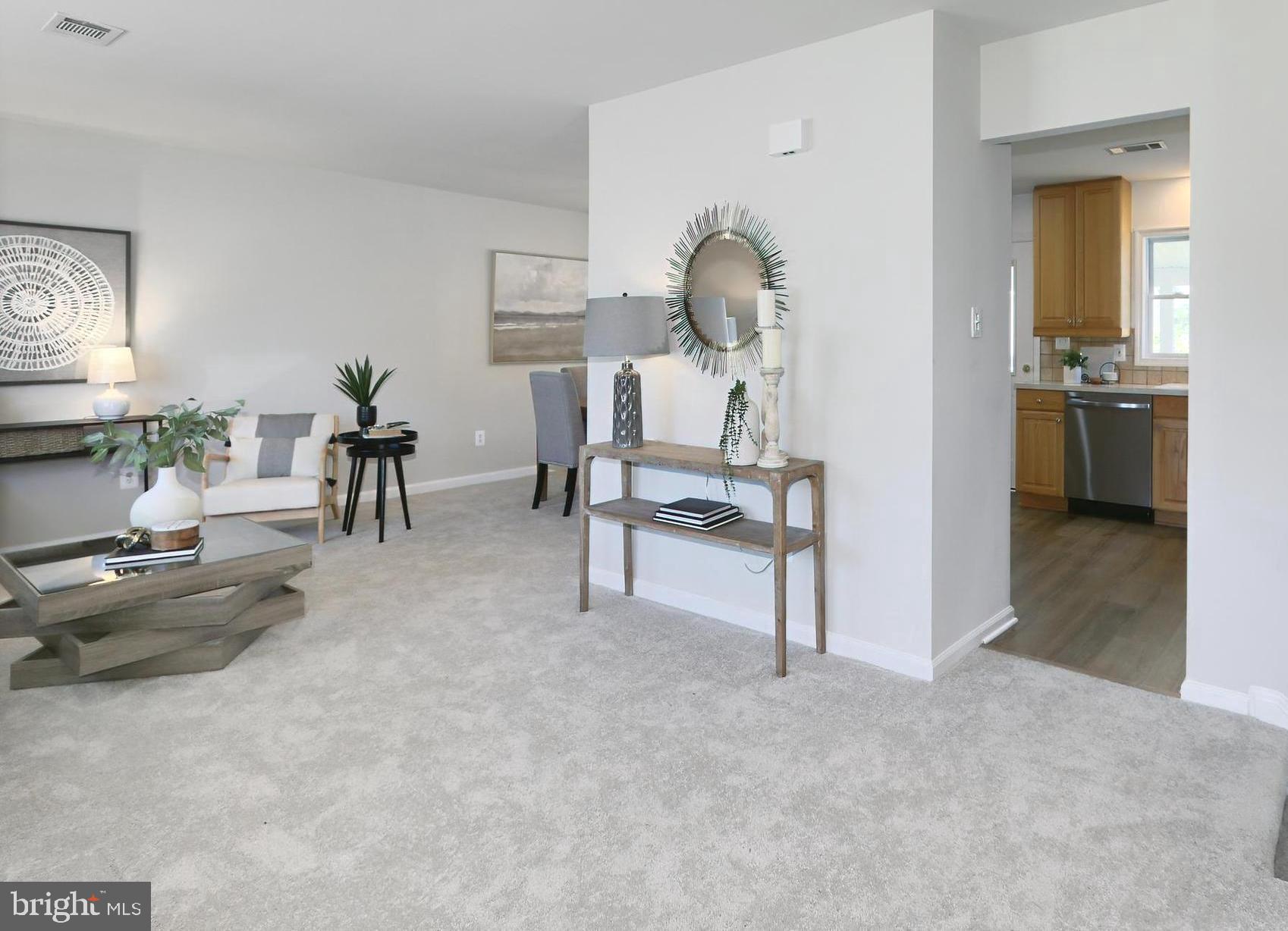 109 North Harrison Road Sterling, VA 20164 - Photo 3 of 32 Open Foyer with NEW Plush Carpeting and Coat Clst