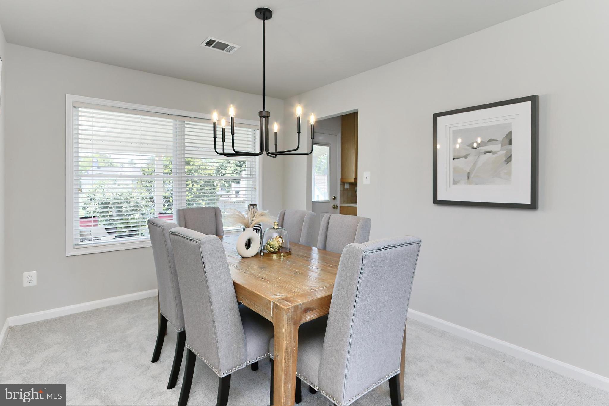 109 North Harrison Road Sterling, VA 20164 - Photo 8 of 32 Lovely Dining Room with New Chandelier