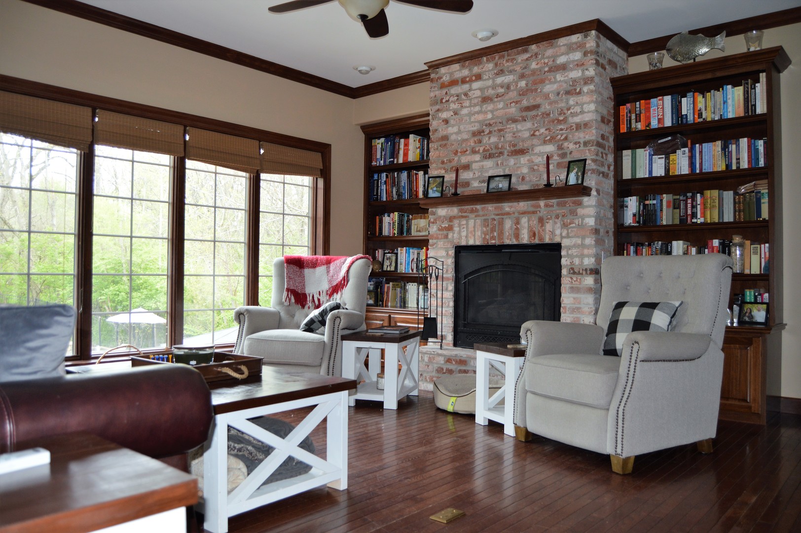 9482 Abbey Way Downs, IL 61736 - Photo 15 of 93 a living room with furniture and a fireplace