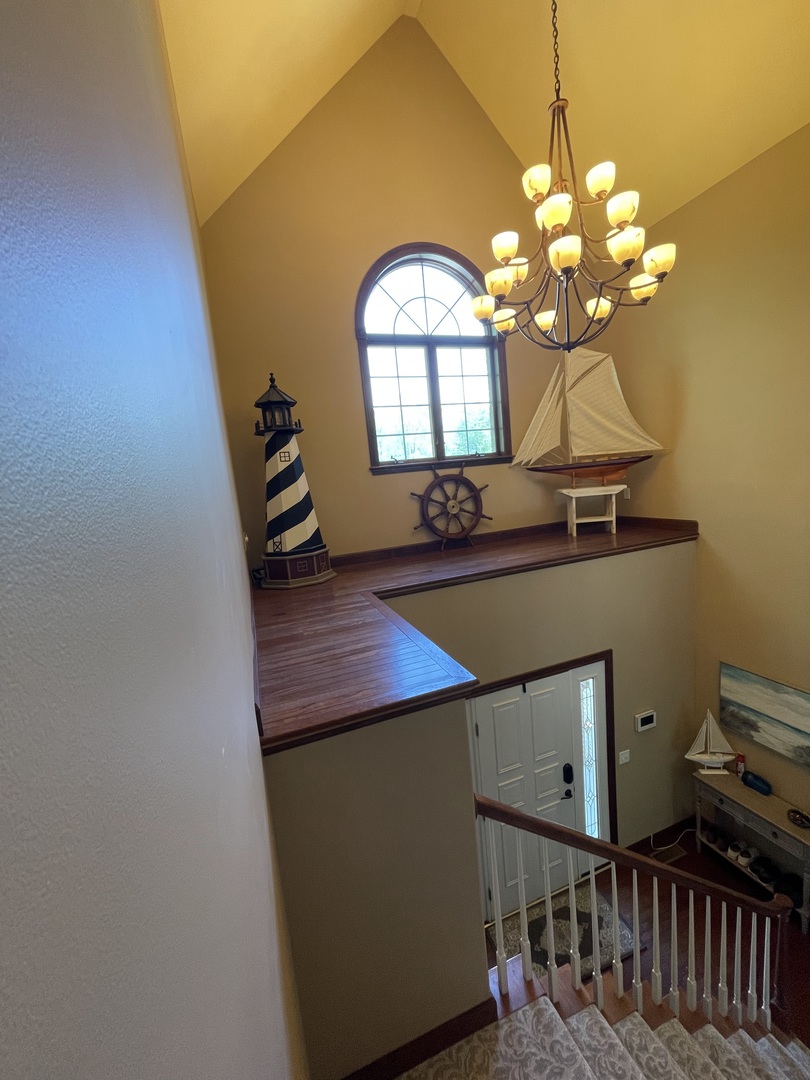 9482 Abbey Way Downs, IL 61736 - Photo 31 of 93 a view of a dining room with a table and chairs