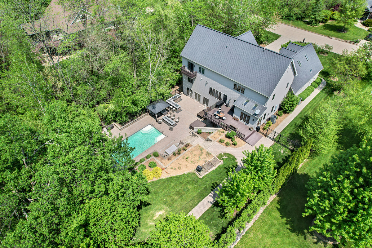 9482 Abbey Way Downs, IL 61736 - Photo 5 of 93 an aerial view of a house with garden space and street view
