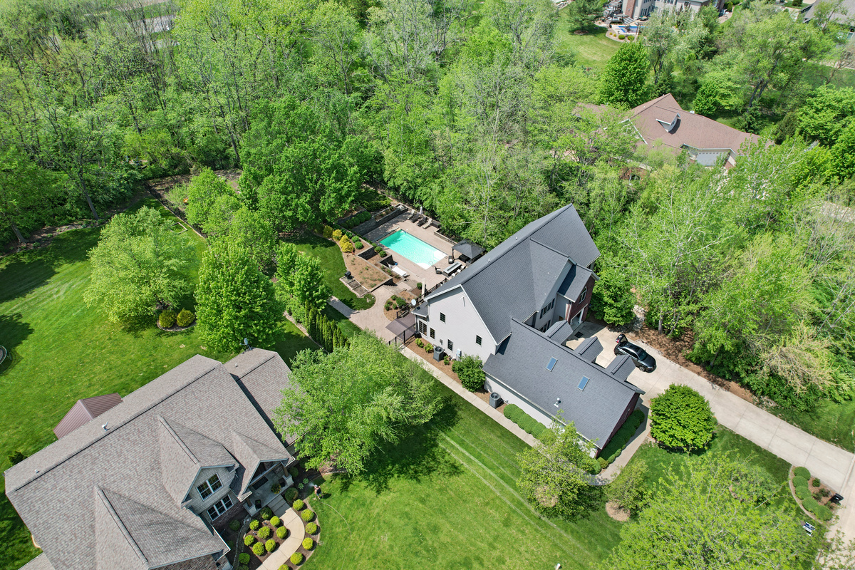 9482 Abbey Way Downs, IL 61736 - Photo 6 of 93 an aerial view of house with yard swimming pool and outdoor seating