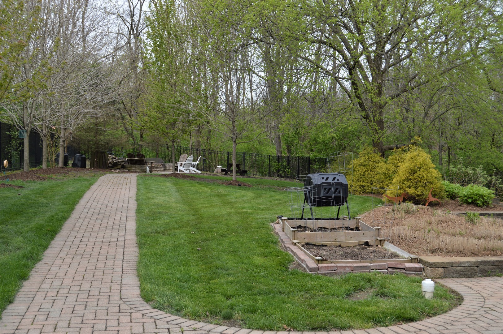 9482 Abbey Way Downs, IL 61736 - Photo 72 of 93 a view of a garden with a slide