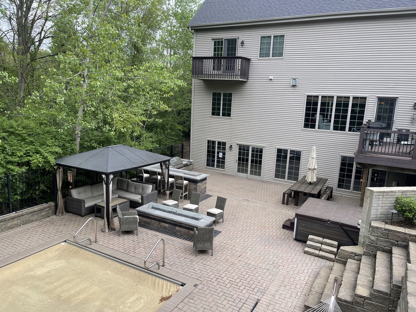 9482 Abbey Way Downs, IL 61736 - Photo 75 of 93 a view of a patio with chairs and tables in the patio