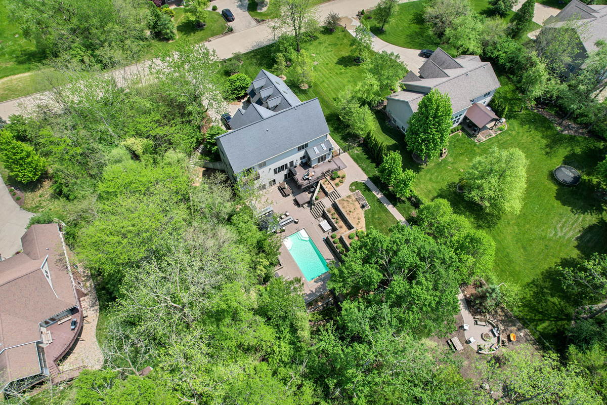 9482 Abbey Way Downs, IL 61736 - Photo 90 of 93 an aerial view of a house with a yard