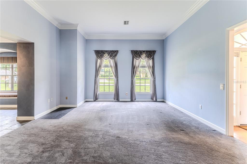 7512 Oak Tree Lane Spring Hill, FL 34607 - Photo 17 of 89 a view of an empty room with window and bathroom